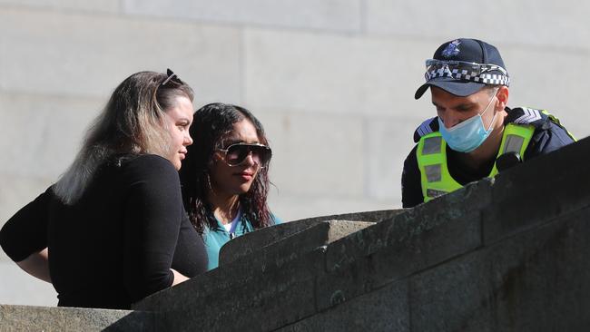 Two women are fined for not wearing masks at the Shrine of Remembrance. Picture: Alex Coppel.