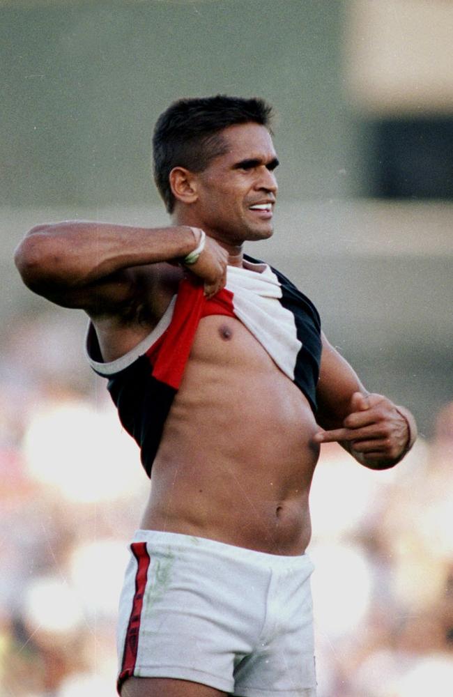 1993: One of the most iconic images in AFL. St Kilda’s indigenous star Nicky Winmar lets the Magpie fans know his feelings about racial abuse at Collingwood’s Victoria Park by pointing to the colour of his skin. Picture: John Feder