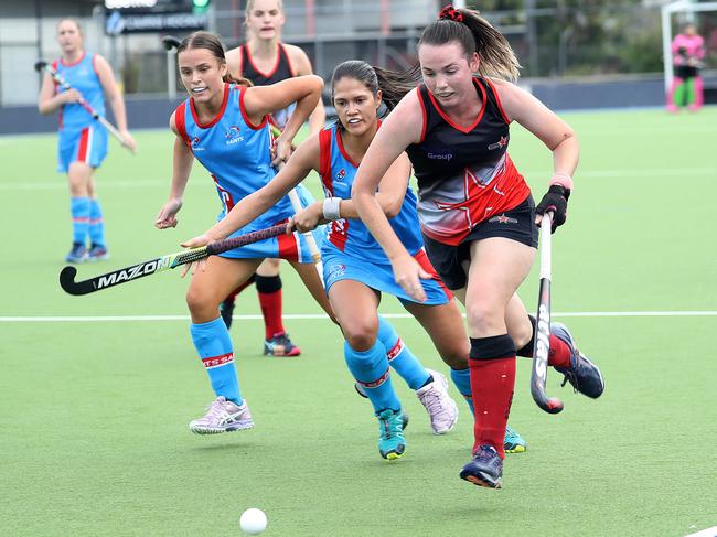 Souths' Liv McArthur and Patrice Butler chasing down Souths Caitlyn Whipp. PICTURE: STEWART McLEAN