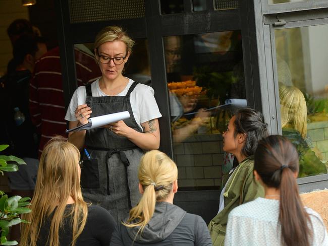 Patience is a muscle, and clipboard-wielding waiters are our personal trainers.