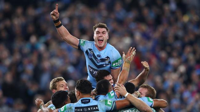 Angus Crichton and the Blues celebrate victory in 2018. Picture: Cameron Spencer/Getty Images