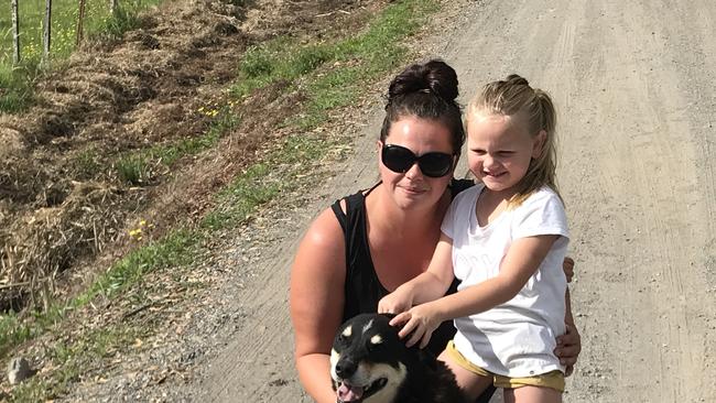 Neighbours of a man found dead at a remote property at sprent on Sunday Anna Winwood, daughter Demi and dog Mac. Police have closed Chilcotts Rd at Sprent as they investigate the man’s death. Picture: Helen Kempton.