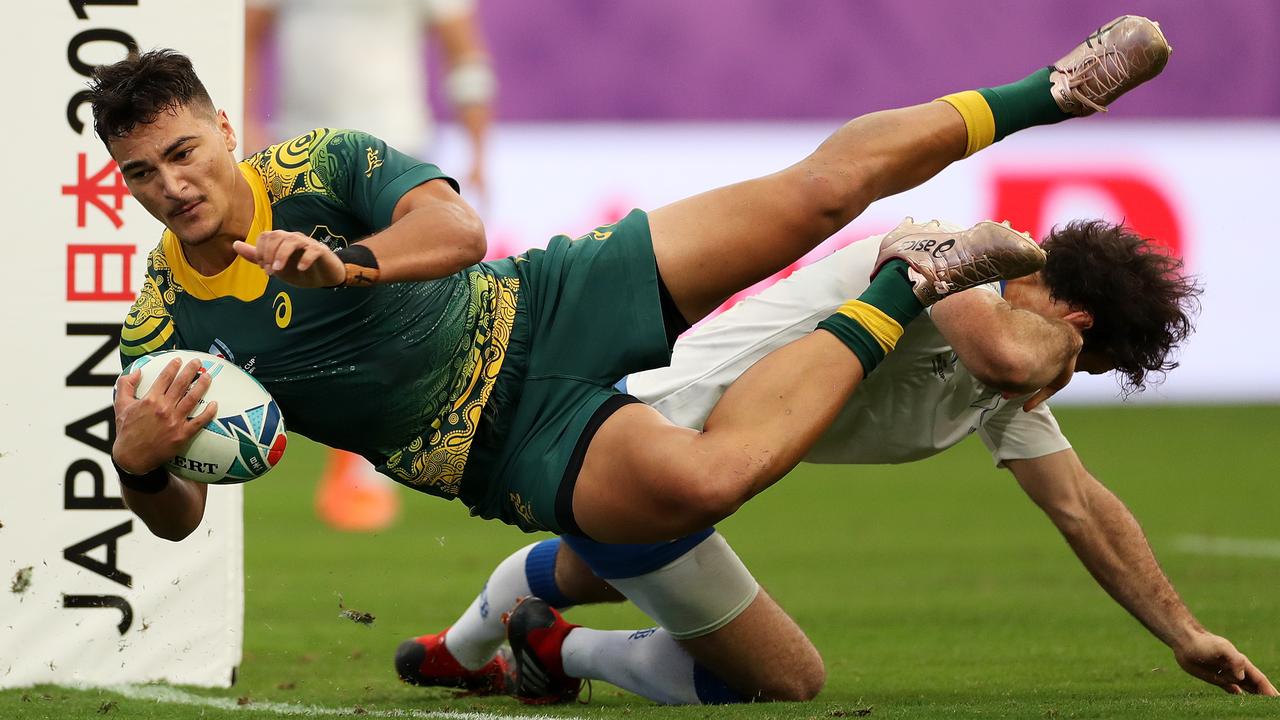 Jordan Petaia of Australia dives to score his side’s second try at Oita Stadium.