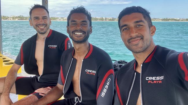 Australians Elias Harrak, left, Tanila De Silva, Hasindu Saranguhewage have been trapped in a five-star resort on the island of Boracay since March 13.