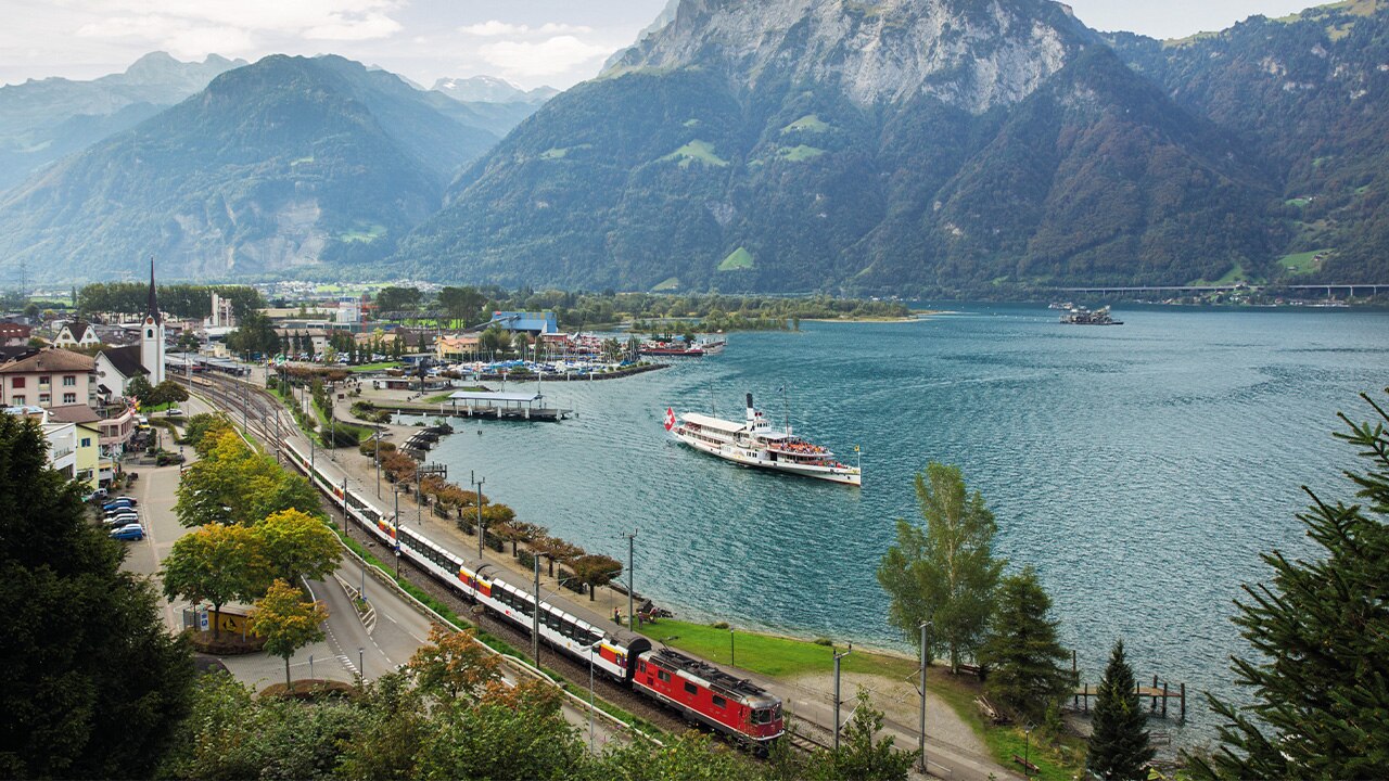 Gotthard Panorama Express at Flüelen where passengers switch to steamboat for the Lucerne leg.