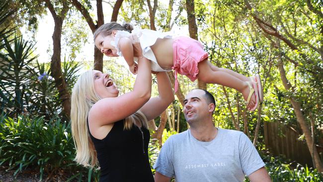 Samantha and Mitchell Thompson, with their daughter Emilia, 20 months, are expecting again after lockdown. Picture: John Feder