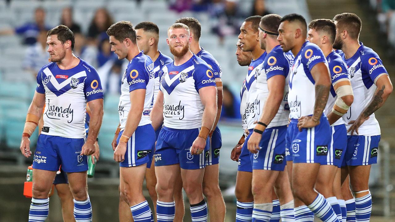 SYDNEY, AUSTRALIA - APRIL 10: Bulldogs players look dejected after conceding a try during the round five NRL match between the Canterbury Bulldogs and the Melbourne Storm at Stadium Australia, on April 10, 2021, in Sydney, Australia. (Photo by Mark Metcalfe/Getty Images)<br/>