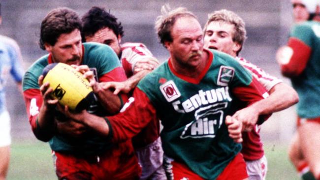 Wally Lewis playing for Wynnum in 1987 alongside Gene Miles.