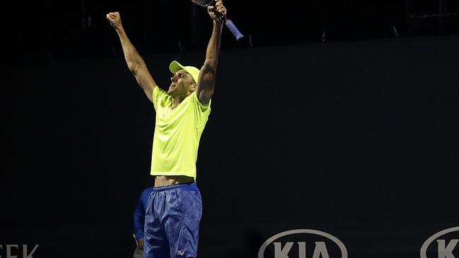 Croatia's Ivo Karlovic celebrates after defeating Argentina's Horacio Zeballos during their first round match at the Australian Open tennis championships in Melbourne, Australia, Tuesday, Jan. 17, 2017. (AP Photo/Aaron Favila)