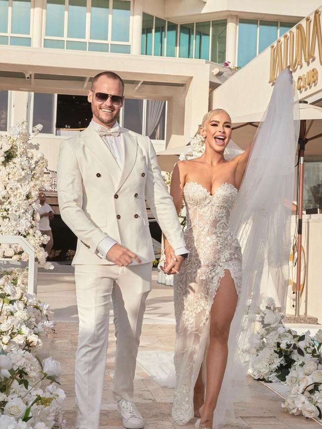 Gonsalves wore a strapless white gown featuring floral detailing and a racy thigh split for her second wedding ceremony. Photo: Instagram