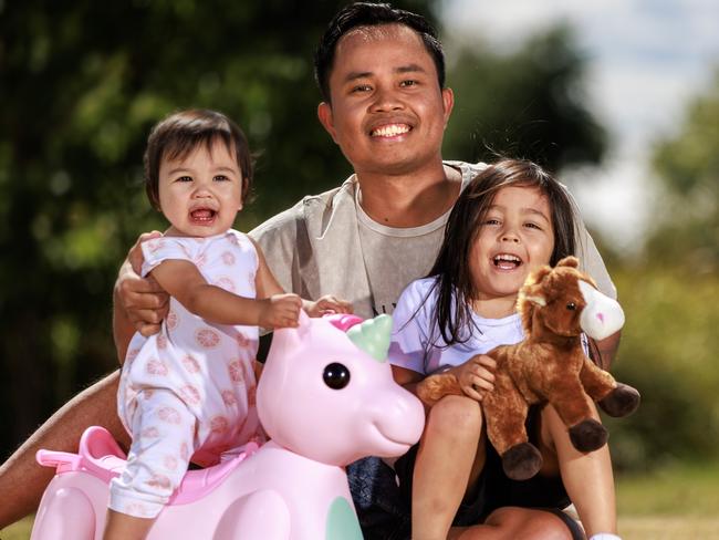 11/03/2023   All-Star Mile 2023 owner ambassador Eko Budi with his kids, Arie, 4, and Anisa, 1. Mr Budi will win between $10k-$250k at the race at The Valley on March 18. He has never been to the races before but has become a fan of horse racing since moving to Australia in 2017Picture: David Geraghty