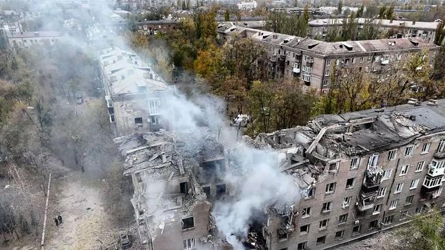 This handout photograph taken and released by the State Emergency Service of Ukraine on November 11, 2024, shows a heavily damaged residential building after a Russian strike in Kryvyi Rig, Dnipropetrovsk region, amid the Russian invasion of Ukraine. (Photo by Handout / STATE EMERGENSY SERVICE OF UKRAINE / AFP) / RESTRICTED TO EDITORIAL USE - MANDATORY CREDIT "AFP PHOTO / State Emergency Service of Ukraine " - NO MARKETING NO ADVERTISING CAMPAIGNS - DISTRIBUTED AS A SERVICE TO CLIENTS