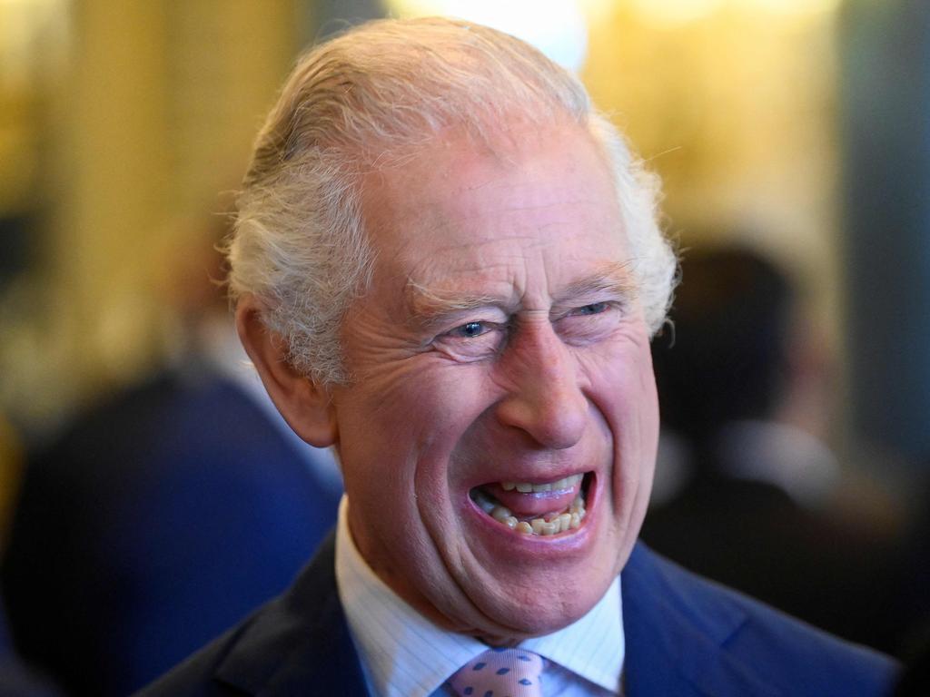 King Charles smiles as he speaks with guests during a Realm Governors General and Prime Ministers Lunch at Buckingham Palace. Picture: AFP