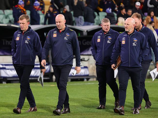 Matthew Nicks with his coaching group, Nathan van Berlo, Scott Burns, head of footy Adam Kelly and Jack Hombsch. Picture: Sarah Reed/AFL Photos