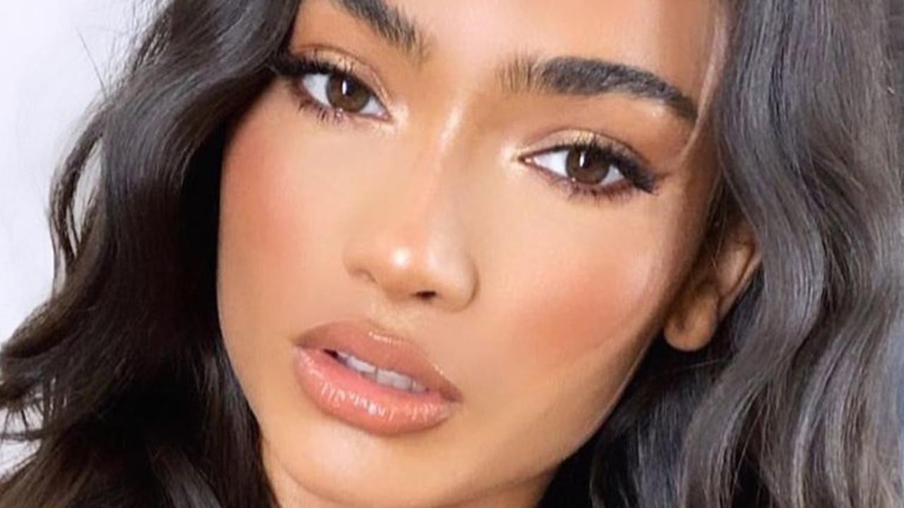 Victoria's Secret model Kelly Gale leaves little to the imagination in tiny  G-string bikini