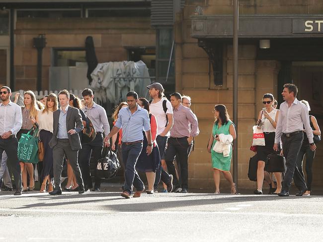 People walk out of St James station on their way to work. Picture: Getty Images