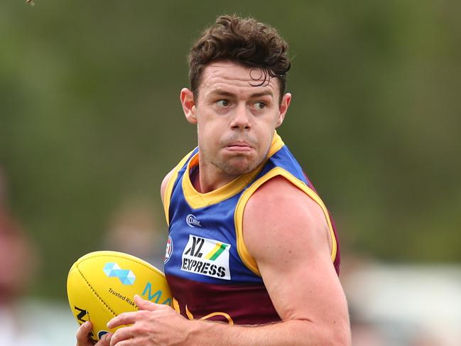 BRISBANE, AUSTRALIA - FEBRUARY 23: Lachie Neale of the Lions runs the ball during the 2020 Marsh Community AFL Series match between the Brisbane Lions and the Port Adelaide Power at Moreton Bay Sports Complex on February 23, 2020 in Brisbane, Australia. (Photo by Chris Hyde/AFL Photos/Getty Images)