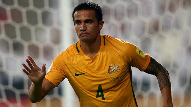 Tim Cahill of Australia celebrates after scoring his team’s winner.