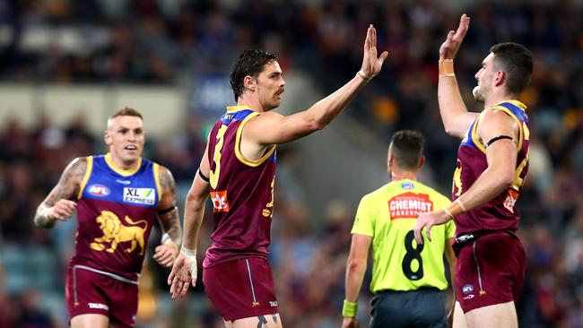 BRISBANE, AUSTRALIA - JUNE 24: Joe Daniher of the Lions celebrates a goal during the round 14 AFL match between the Brisbane Lions and the Geelong Cats at The Gabba on June 24, 2021 in Brisbane, Australia. (Photo by Jono Searle/AFL Photos/via Getty Images)