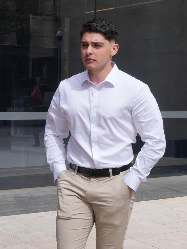 Marco Yandle, who held a torch while his father shot and killed Steven Murphy in a shed at their Kuala Home, leaving court. The DPP has asked for a review of his sentence. Picture: NewsWire / Dean Martin