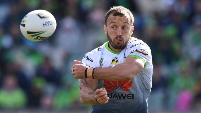 Josh Hodgson passes the ball during Canberra’s clash with the Wests Tigers. Picture: AAP