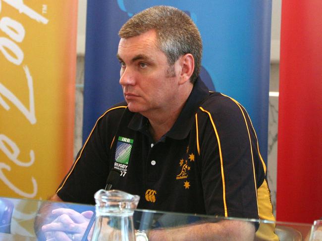 Australian rugby national team head coach John Connoly (L), his deputy Scott Johnson (R), and manager Phil Thomson give a press conference, 01 August 2007 in Montpellier, southern France, one week before the beginning of the rugby World Cup in France. AFP PHOTO PASCAL GUYOT