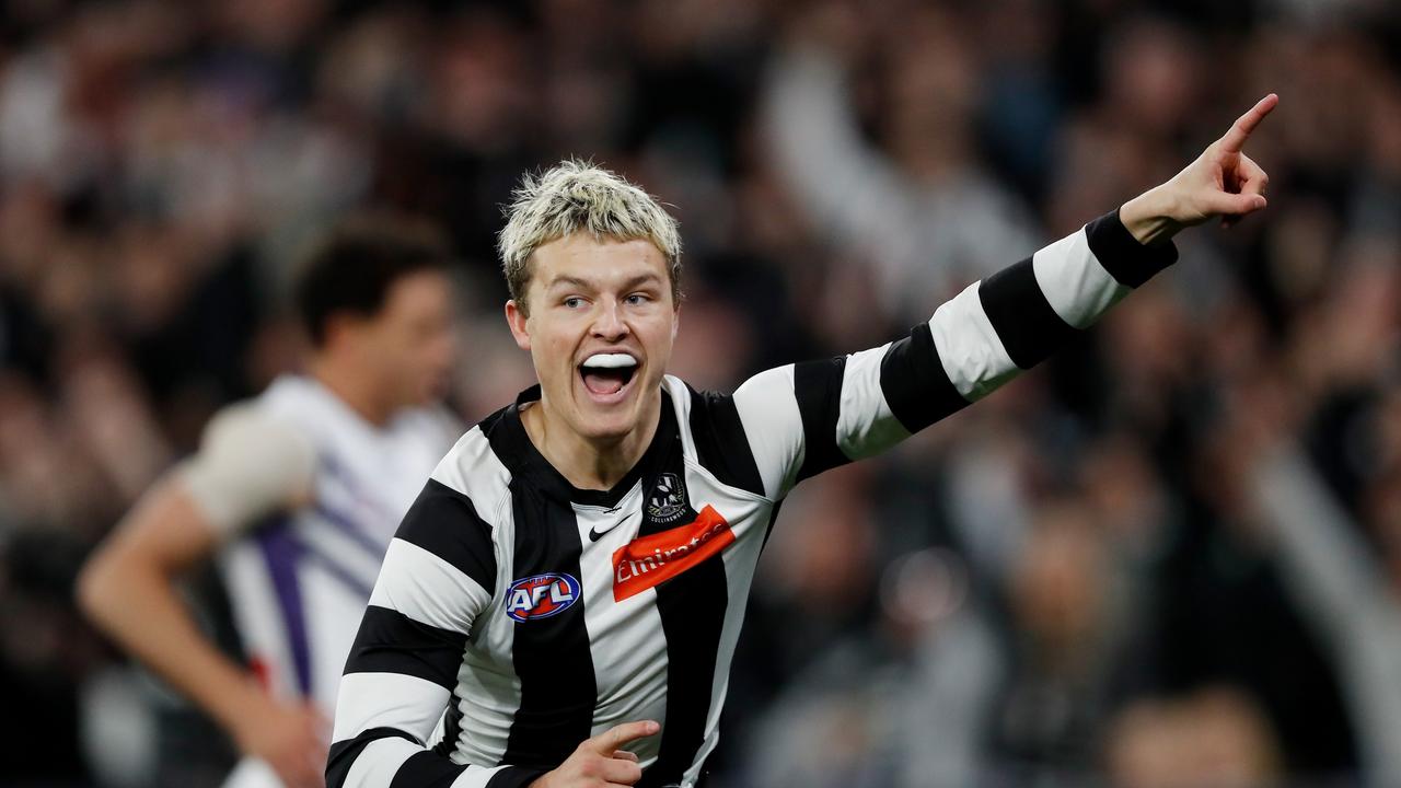 Jack Ginnivan celebrates one of his three goals. Picture: Dylan Burns/AFL Photos via Getty Images