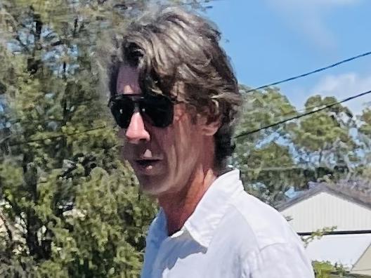 Daniel Lee Fraser leaves Coffs Harbour court charged with failing to comply with reporting obligations of being on the child protection register and allegedly possessing child abuse material.
