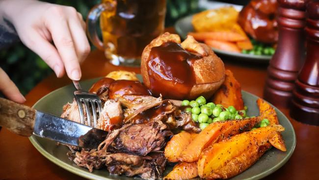 The Dove &amp; Olive’s traditional Sunday roast accompanied by a pint. Picture: Jenifer Jagielski