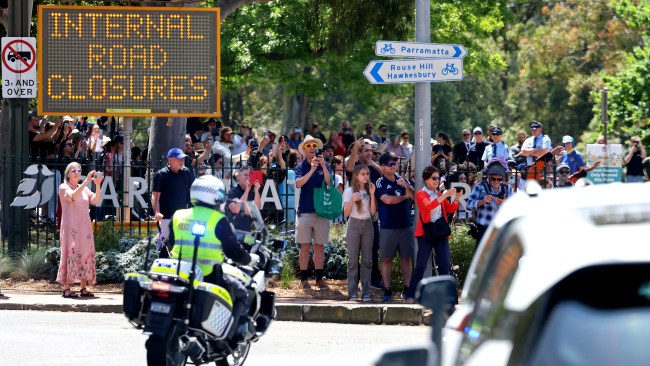 Sydneysiders line the sides of the road in Western Sydney to see King Charles and Queen Camilla at Parramatta Park. Picture: Chris Jackson/Getty Images