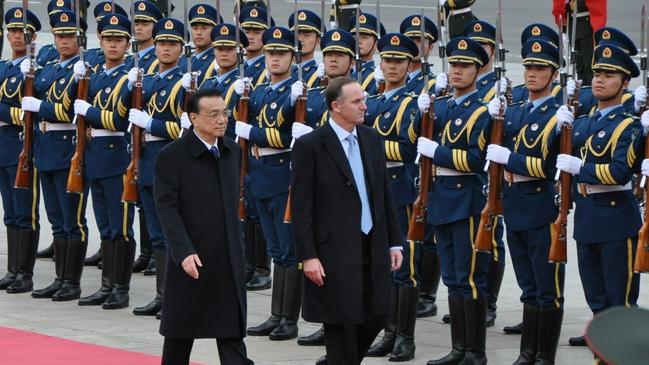 The NZ Prime Minister John Key and China's Premier Li Keqiang inspect a military guard of honour at the Great Hall of the People, Beijing, in 2013. Picture: NZN /Laura McQuillan.