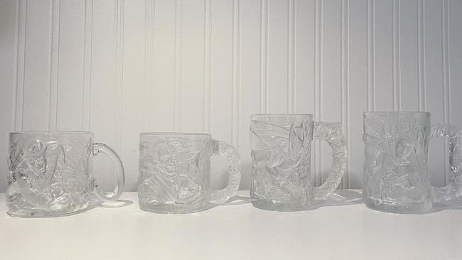 This complete set of the McDonalds 1995 Batman Forever glass mugs recently sold for $110 for its seller based in Morningside, Queensland. Picture: eBay / @breeannakyli3