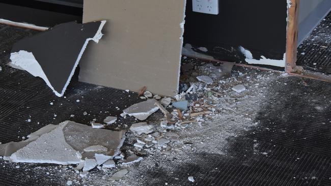The gyprock that had cladded the wall was now rubble on the ground leaving large patches of the building’s framework exposed. Picture: Lillian Watkins