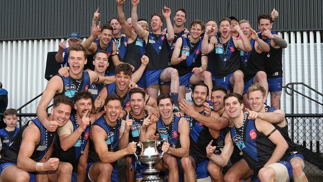 Uni Blues celebrate with the trophy after VAFA (Premier) Grand  Final: University Blues v St Kevin's on Sunday, September 22, 2019, in Elsternwick, Victoria, Australia. Picture: Hamish Blair