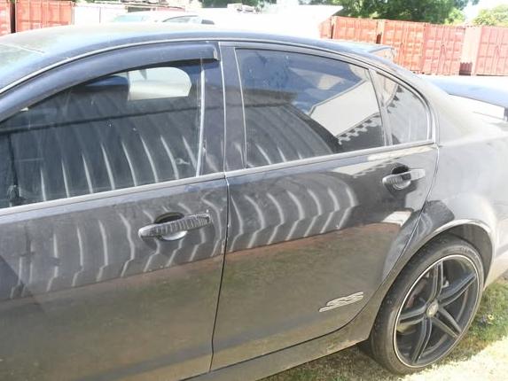 Police release image of black Holden Commodore sedan at the centre of an unsolved home invasion in Wellington.