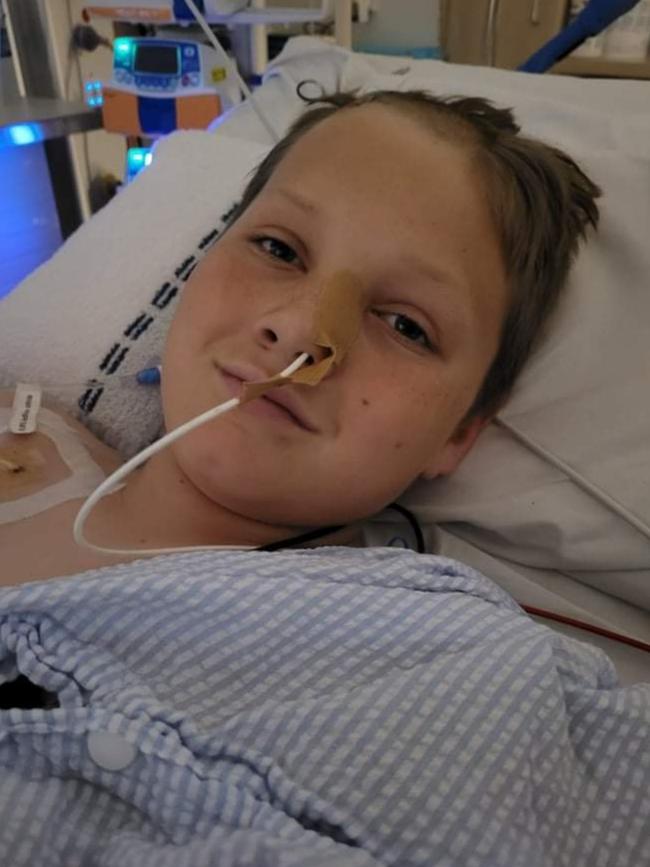 Hillcrest student Declean recovers in hospital following the jumping castle tragedy in Devonport. Pic: Facebook.