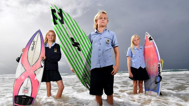 Amelia Craike, Luca Martin and Maddison KenchingtonInaugural Australian Interschool Surfing Competition.Friday May 17, 2024. Picture, John Gass