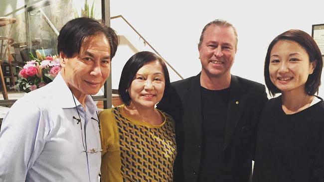 Neil Perry was also known to frequent the venue for a late night snack after work. He is here pictured with restaurant owner Philip Chau (L) and his family. Picture: BBQ King