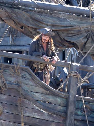 The real Johnny Depp shooting scenes on board The Dying Gull on the set of Pirates of the Caribbean: Dead Men Tell No Tales at The Spit. Pics Tim Marsden