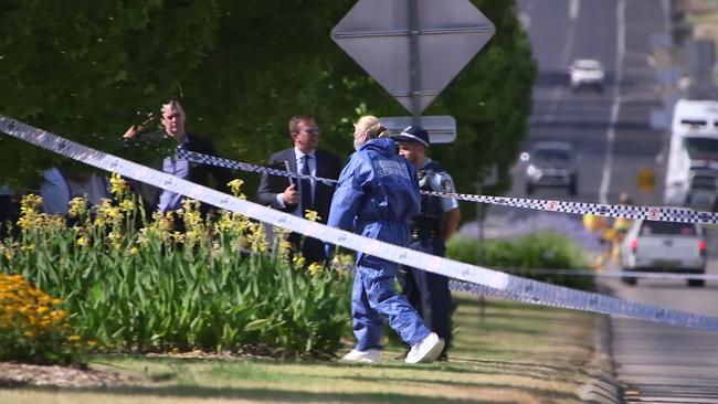 Forensic police enter the house where the officers were shot. Picture: Frank Redward