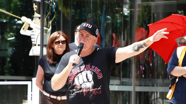 Union members speaking outside 1 William Street in the Brisbane CBD on Wednesday. Picture: NCA NewsWire/Tertius Pickard