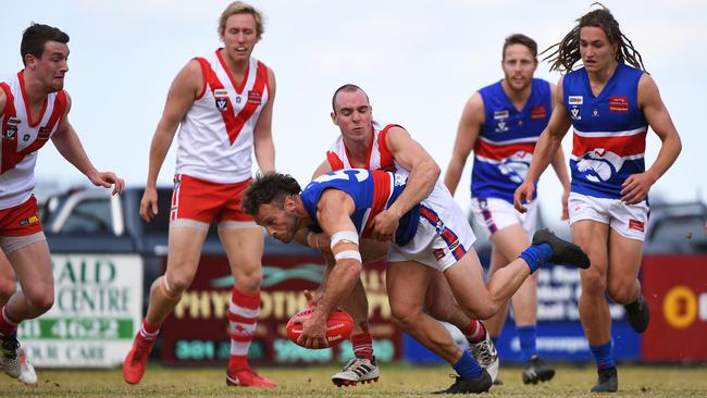 Wandin’s Josh Ladner is pinned during Saturday’s clash with Olinda Ferny Creek. Picture: James Ross