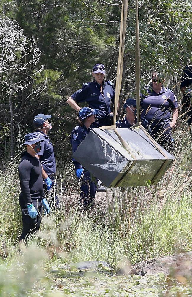 The toolbox is lifted out of the waters in February 2016. The crown has told Brisbane Supreme Court Mr Breton and Ms Triscaru died either by asphyxiation or drowning.