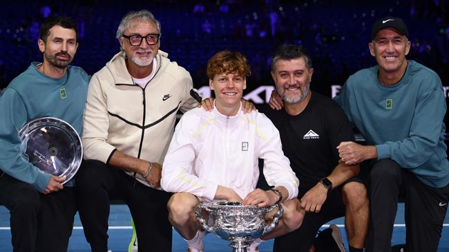 Team Sinnr: Jannik Sinner poses with his coaching staff, including Simone Vagnozzi, far left, and Darren Cahill, far right, after beating Alexander Zverev. Picture: Getty Images