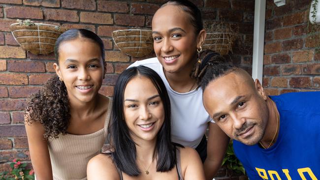 Kat Clark with her daughters Deja, Latisha and husband Jonathan. Picture: David Kelly