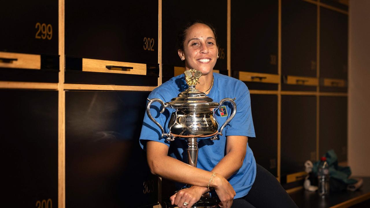 Madison Keys poses with the Daphne Akhurst Memorial Cup in the locker room. (Photo by Fiona HAMILTON / TENNIS AUSTRALIA / AFP)