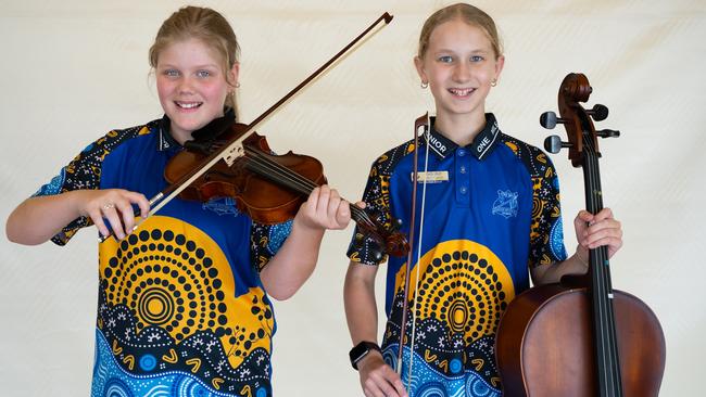 Molly Cork and Tully Bell from One Mile State School prepare for the small instrumental ensemble strings (primary school) at the Gympie Eisteddfod. August 1, 2023. Picture: Christine Schindler