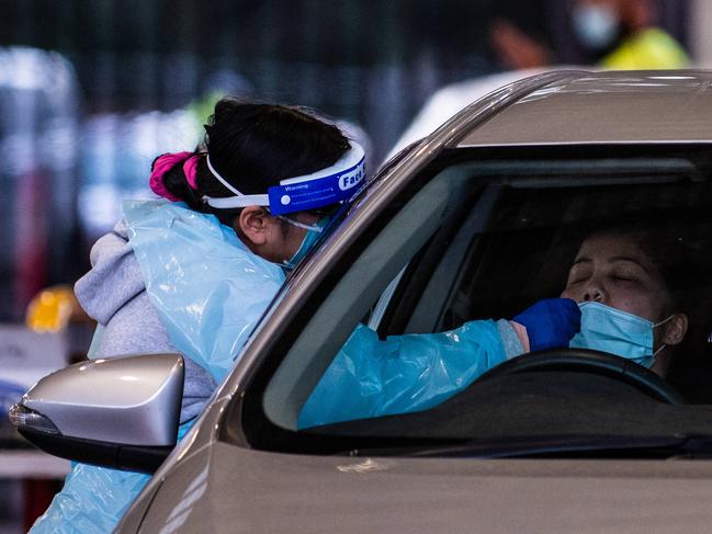 SYDNEY, AUSTRALIA - NewsWire Photos July 18, 2021: Covid testing and cars lined up at Fairfield covid drive through clinic. Picture: NCA NewsWire / Flavio Brancaleone