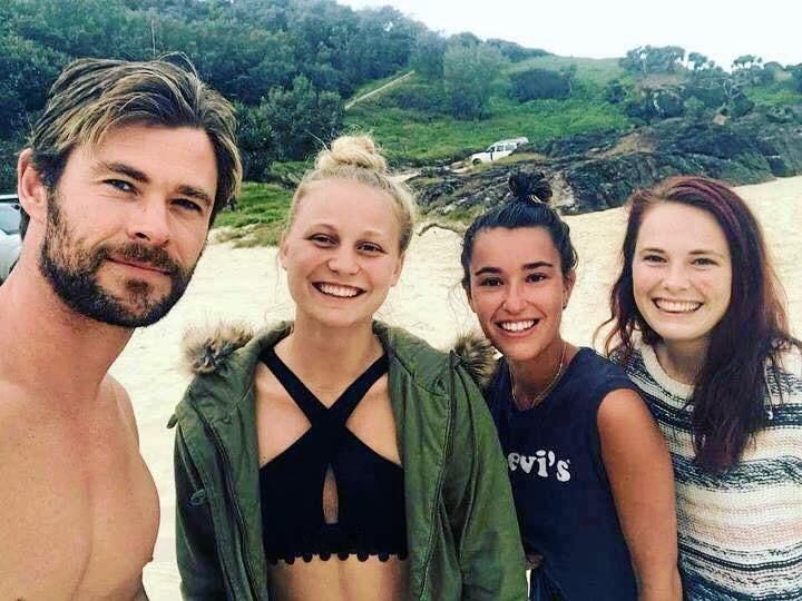 KEEPING IT REAL: Chris Hemsworth with Isabella Wood with her friend Tessa Cantori and sister Laura Wood camping at Double Island Point. Rumours persist - and we have been unable to confirm them despite multiple sightings - the Hemsworths have bought a property in the Gympie region. They are not the only rich and famous people to making that smart move. Picture: Contributed