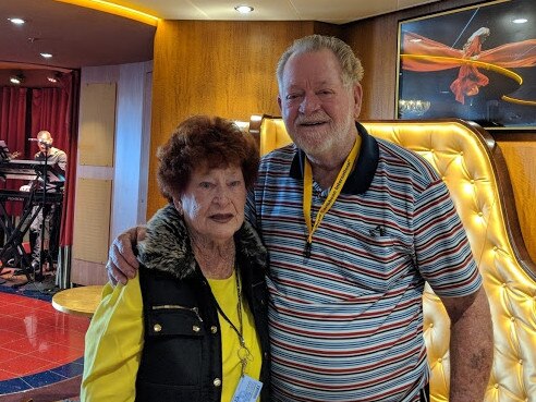 Townsville residents Betty Winters and Robert "Buck" Rogers on-board the Ovation of the Seas. Robert was listed as those missing after the volcano on White Island, New Zealand erupted and his family feared the worst.